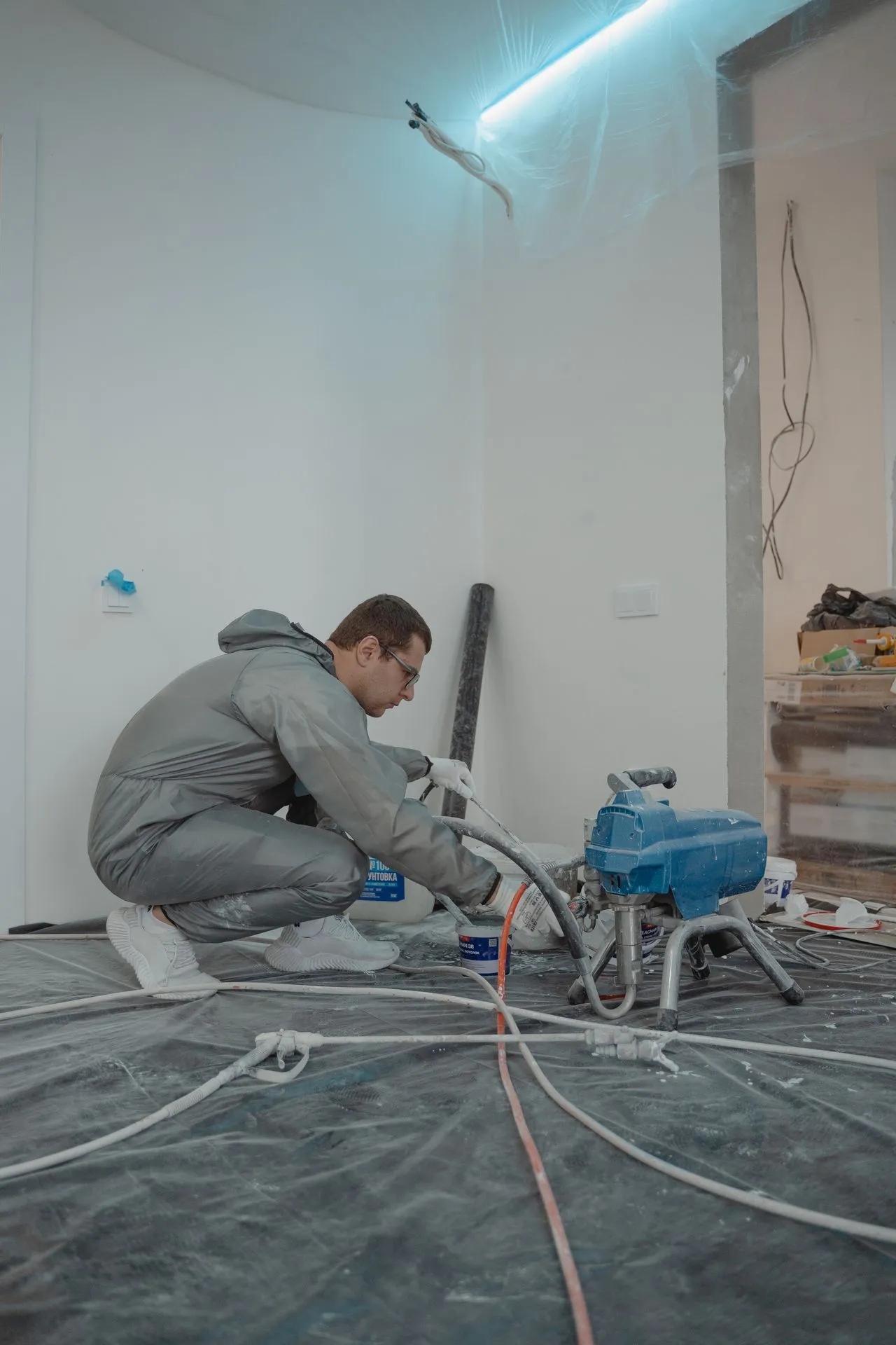 A restoration contractor reviewing open invoices at a desk